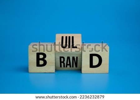 wooden cube with the word Build your brand symbol. the concept of building its own brand