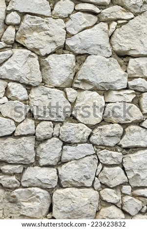 Stone Wall with Random Tiled Pattern. Background and Texture for text or image.