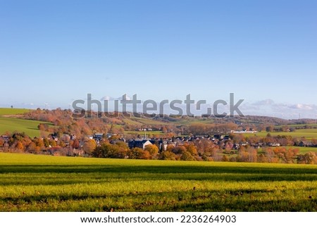 Colorful Autumn landscape of hilly countryside in Zuid-Limburg, Small houses on hillside with sunlight in morning, Partij is a village in southern part of the Dutch province of Limburg, Netherlands.
