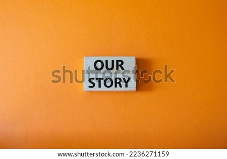 Our story symbol. Wooden blocks with words Our story Beautiful orange background. Business and Our story concept. Copy space. Royalty-Free Stock Photo #2236271159
