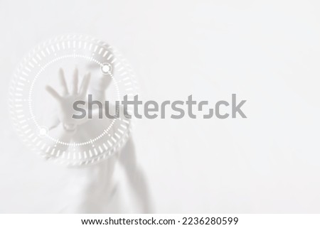 Blurred White Robot Cyborg Man with Hand Touching on Motion Hi Tech Circle Interface HUD, Suitable for Technology Concept.