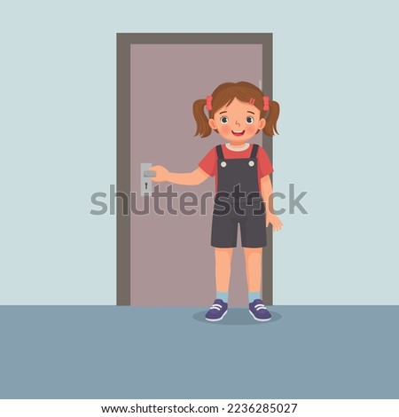 Cute little girl closing the door