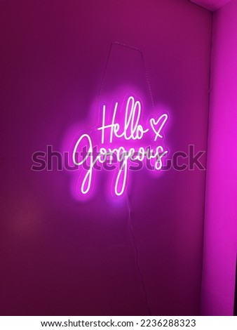 Hello Gorgeous. Neon nightlife love in pink.
