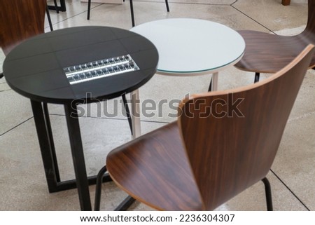Empty cafeteria or restaurant tables with chairs, stock photo
