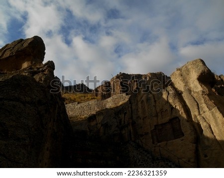 Geghard is a medieval monastery in the Kotayk province of Armenia, being partially carved out of the adjacent mountain, surrounded by cliffs. It is listed as a UNESCO World Heritage Site. 