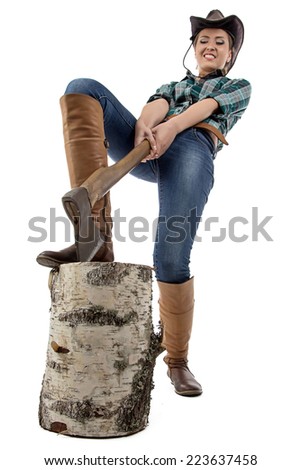 Image of young woman chops wood on white background