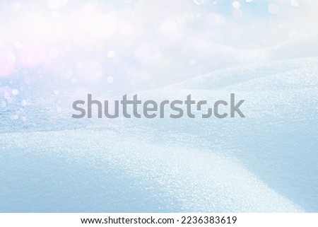 BLUE CHRISTMAS BACKGROUND, WINTER BACKDROP, COLD FROSTY NATURAL DESIGN WITH SNOW AND BOKEH LIGHTS FOR MONTAGE WINTER PRODUCTS OR CHRISTMAS GIFTS AND PRESENTS