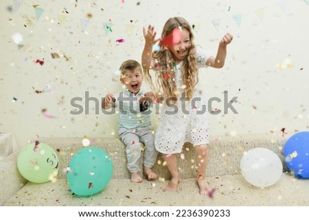 Confetti rain on a birthday Royalty-Free Stock Photo #2236390233