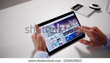 Video Editor Or Designer Using Editing Software Tech On Tablet
