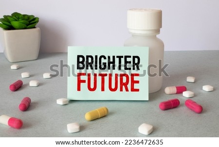 Brighter Future text on notepad on office desk.
