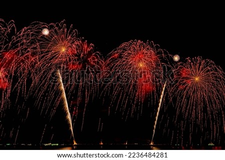 Firework display at night on isolated black background