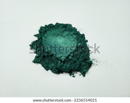 Pile of Natural Dark Green Mica Powder Pigment on a White Background Royalty-Free Stock Photo #2236554021