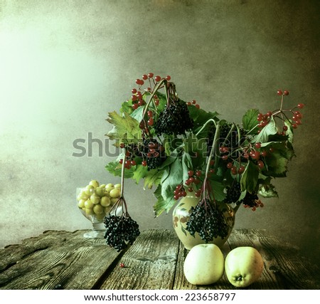 Autumn bouquet: Still Life with sprigs of elderberry