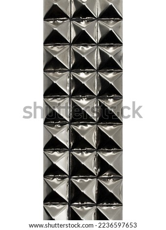 Leather belt with accessories. Belt with metal studs in the form of a pyramid. Accessories and decorations for mtalheads, rockers, punks, bikers, goths. Royalty-Free Stock Photo #2236597653
