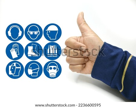 The hand  thumb up and icons of safety at workplace isolated white background  .Concept of workplace safety Or Safety at work. Royalty-Free Stock Photo #2236600595