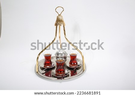 turkish black tea served with metal tray