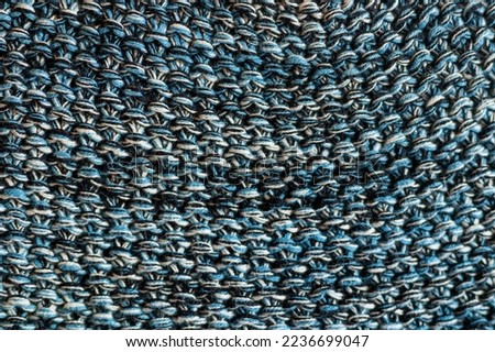 Knitting. The texture of the knitted fabric. Background. The texture of knitted fabric. Knitted products.