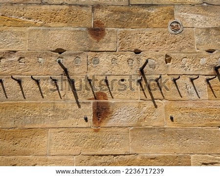 A close up view of a sandstone building made of hand  hewn blocks by early convicts on Cockatoo Island, NSW, Australia.