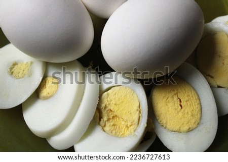 Boiled egg and slices with yolk stock photo 