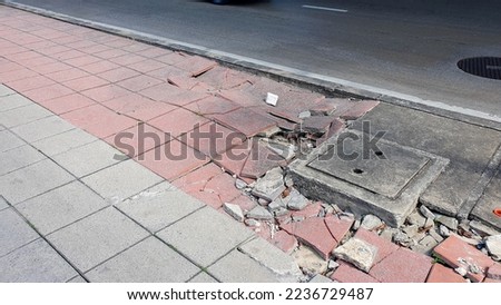 Footpaths in Thailand are damaged and dangerous , The pedestrian surface needs to be repaired. Royalty-Free Stock Photo #2236729487