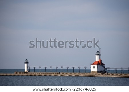 The lighthouse in St. Joseph on Lake Michigan in the daytime with late afternoon sun. Royalty-Free Stock Photo #2236746025