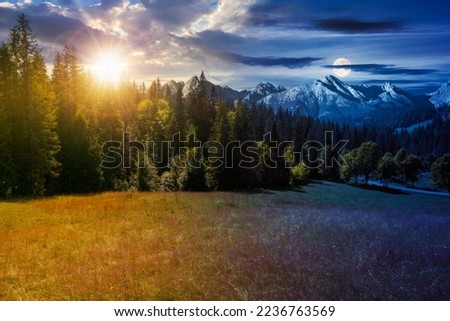 carpathian mountain landscape at summer twilight. day and night time change concept. beautiful countryside with forested hills and road through the valley with sun and moon