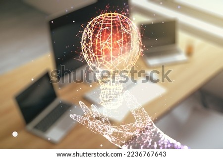 Creative light bulb illustration and modern desktop with pc on background, future technology concept. Multiexposure