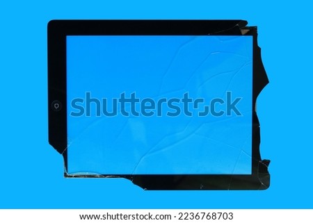 cracked screen tablet isolated on blue background, broken screen isolated on a blue background, broken glass - white lines on blue background , top view
