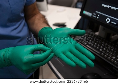 Optical coherence tomography (OCT). Purge catheter with contrast. Intravenous Administration of Contrast Agents for Enhanced CT or MR Scans. Heart catheterization instrument for heart surgery. Royalty-Free Stock Photo #2236783465