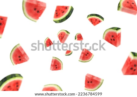 Falling watermelon isolated on white background, selective focus Royalty-Free Stock Photo #2236784599