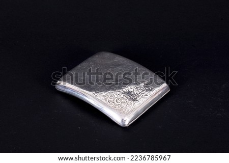 Old silver antique sheets made of different alternative compositions on black background Macro Detail shot abstract pastel interesting different amazing background images souvenir retro sheets buying.