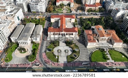 Aerial photo of iconic landmark neoclassic buildings of Academy, University and public Library in the heart of Athens historic centre, Attica, Greece