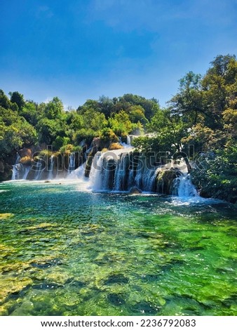 Waterfall and water park. Waterfalls in national park. Nice nature and landscape at the popular tourist attraction. It's known for a series of 7 waterfalls. Plitvice lakes national park Royalty-Free Stock Photo #2236792083