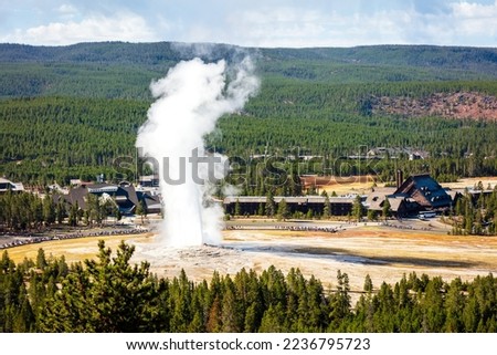 Old Faithful geyser at Yellowstone Park Royalty-Free Stock Photo #2236795723