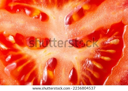 Tomato texture as a background. A close shot of a Tomato . Macro photo. Tomato . Close-up