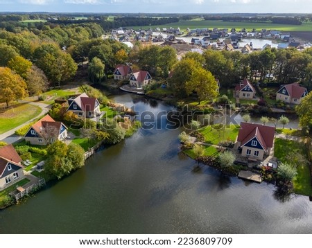 Dutch landscape, aerial view on houses and lakes in Drenthe province, Netherlands in autumn