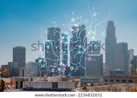 Los Angeles panorama skyline of downtown at day time, California, USA. Skyscrapers of LA city. Hologram of Artificial Intelligence concept. AI and business, machine learning, neural network, robotics