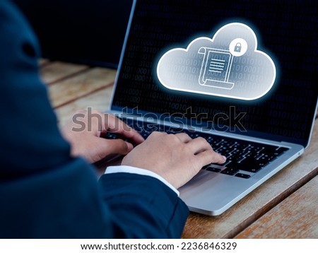 Sovereign cloud technology concept. Laws and regulations with padlock on cloud icons on laptop computer screen. Data security, control and access with strict requirements of local laws on privacy. Royalty-Free Stock Photo #2236846329