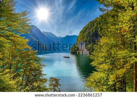 Forest window with view on lake near Schoenau am Koenigssee, Konigsee, Berchtesgaden National Park, Bavaria, Germany. Royalty-Free Stock Photo #2236861257