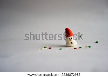 Decorated Christmas tree on blurred background with light.