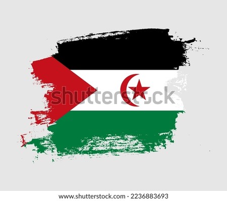 Artistic Western Sahara national flag design on painted brush concept