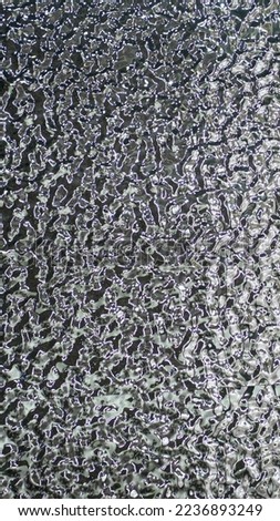 Background of molten metal, liquid steel close-up. Liquid metal texture, shiny reflective surface, copy space