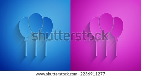Paper cut Balloons with ribbon icon isolated on blue and purple background. Paper art style. Vector