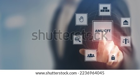 Anti Money Laundering (AML) and Countering the Financing of Terror (CFT) regulations and compliance concept.  Turning to regulatory web data to enhance  AML, CFT compliance and mitigate liability. Royalty-Free Stock Photo #2236964045