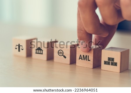 Anti Money Laundering (AML) regulations and compliance concept.  Turning to regulatory web data to enhance  AML compliance and mitigate liability. Fighting dirty money and illicit financial flows. Royalty-Free Stock Photo #2236964051