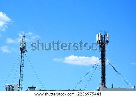 Pole with mobile phone antennas and wireless internet