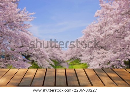 wooden table with flowers bokeh background