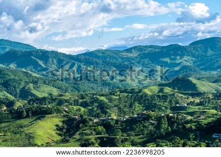 The majestic Andes Mountains around Jerico (Jericó) , Antioquia, Colombia. Beautiful evening blue sky with white clouds. picture taken from the Morro el Salvador.