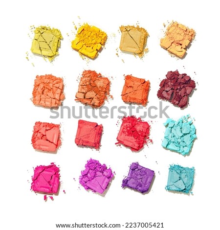 Set colorful swatches beauty product multi-colored eyeshadows for makeup isolated on white background, flat lay of crushed eyeshadows vivid colors, cosmetic textures, top view design elements