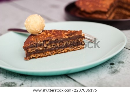 Pieces of chocolate cake decorated with pralines
